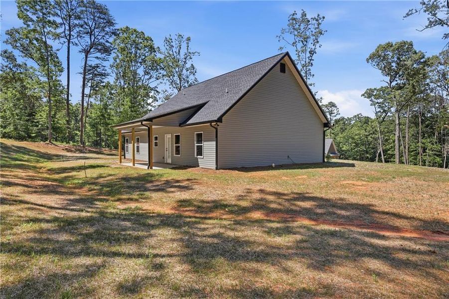 Exterior details and patio area of a home in , Clarkesville (Image 4).