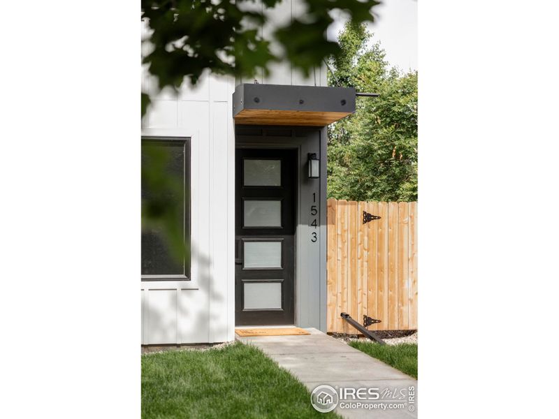 Front exterior of a new home in , Denver, CO, highlighting curb appeal (Image 24).