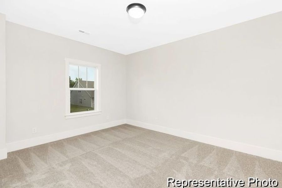 Representative unfurnished interior of a home built from the Bedford P by True Homes in Homecoming, Ravenel (Image 14).