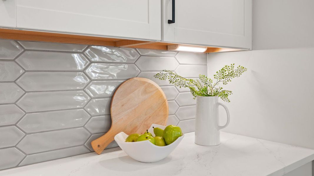 Furnished interior view inside a new home in Summerwind Crossing at Lakes of Cane Bay, Summerville (Image 11).
