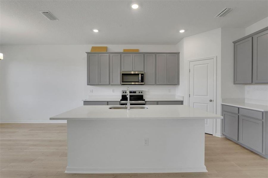 Furnished interior view inside a new home in Willowbrook North, Winter Haven (Image 6).