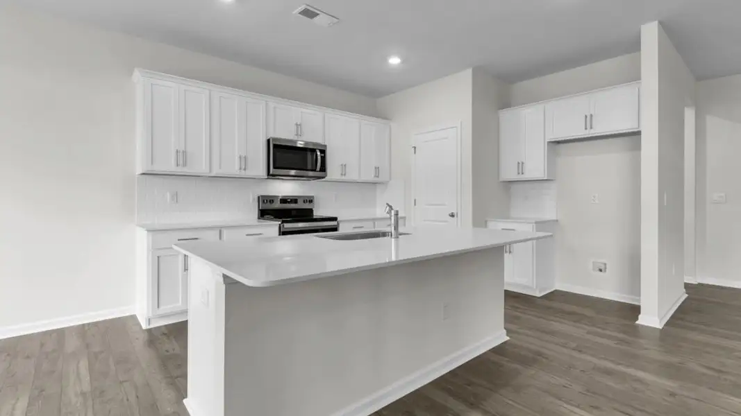 Furnished interior view inside a new home in Villa Grande, Winterville (Image 6).