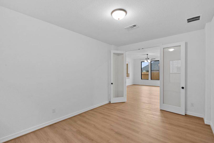 An inviting study creates the perfect balance of privacy and connection for work or relaxation.