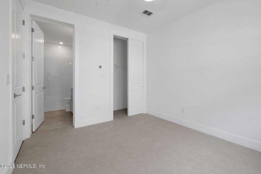Spacious, unfurnished interior of a new home in North Beach Townhomes, Jacksonville Beach (Image 26).