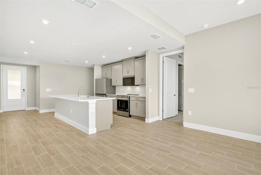Furnished interior view inside a new home in Wellen Park, Venice (Image 7).