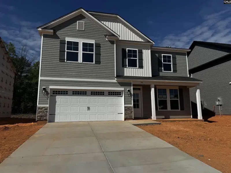 Front exterior of a new home in Boykin Hills, Chapin, SC, highlighting curb appeal (Image 1). Front exterior of a new home in Boykin Hills, Chapin, SC, highlighting curb appeal (Image 1).
