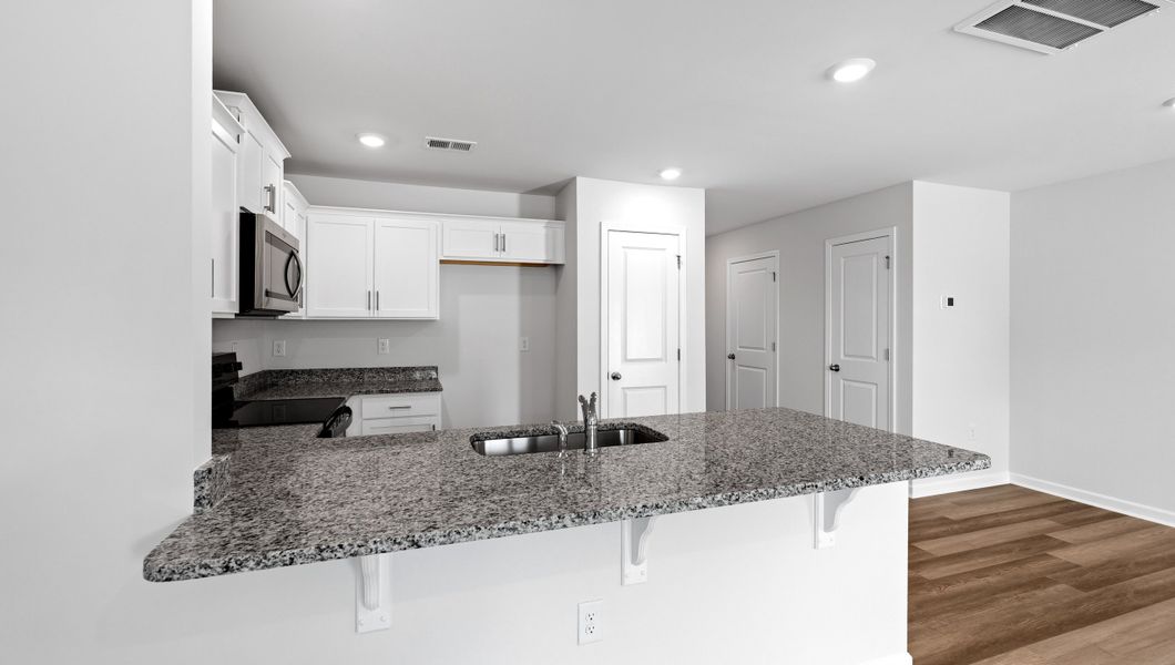 Furnished interior view inside a new home in Chestnut Ridge Townhomes, Greenville (Image 6).