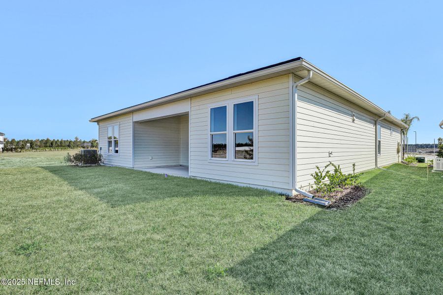 Exterior details and patio area of a home in Discover 55+ Living at Silverleaf, St. Augustine (Image 4).