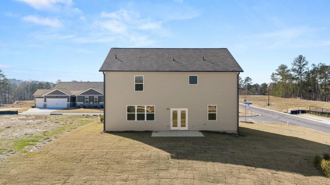 Exterior details and patio area of a home in Fairway 17 at Mirror Lake, Villa Rica (Image 4).