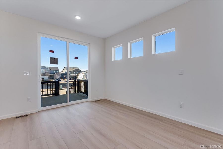 Spacious, unfurnished interior of a new home in Crescendo at The Aurora Highlands, Aurora (Image 35).
