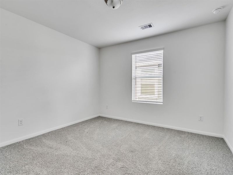 Spacious, unfurnished interior of a new home in Sweetgrass Village, Barrett (Image 18).