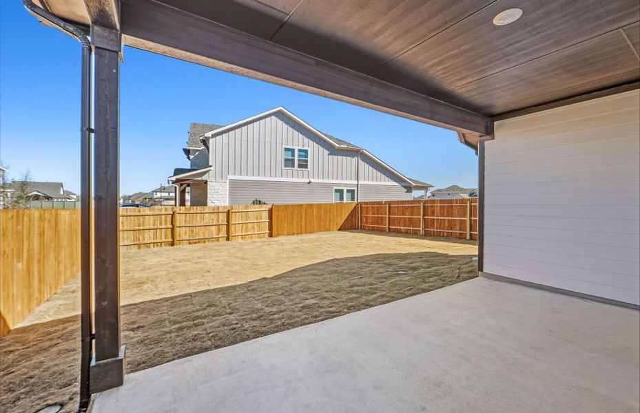 Exterior details and patio area of a home in Santa Rita Ranch, Liberty Hill (Image 4).