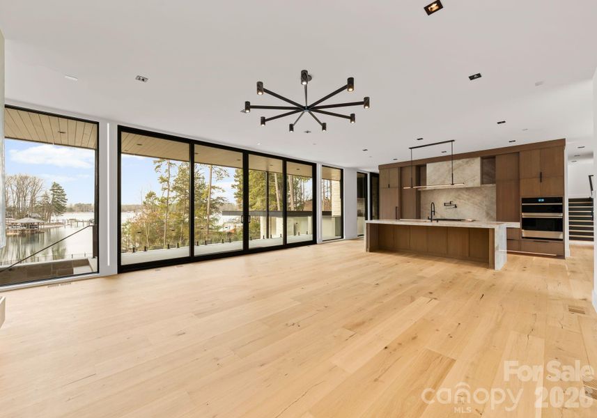 Open-concept main living area including the living room and kicthen. Open-concept main living area including the living room and kicthen.