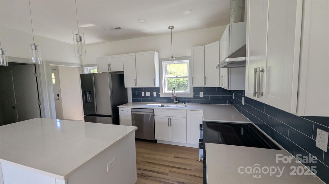 Furnished interior view inside a new home in , Waynesville (Image 3).