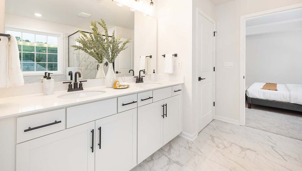 Representative furnished interior of a home built from the Summit by D.R. Horton in Sylvan Creek, Denver (Image 19).