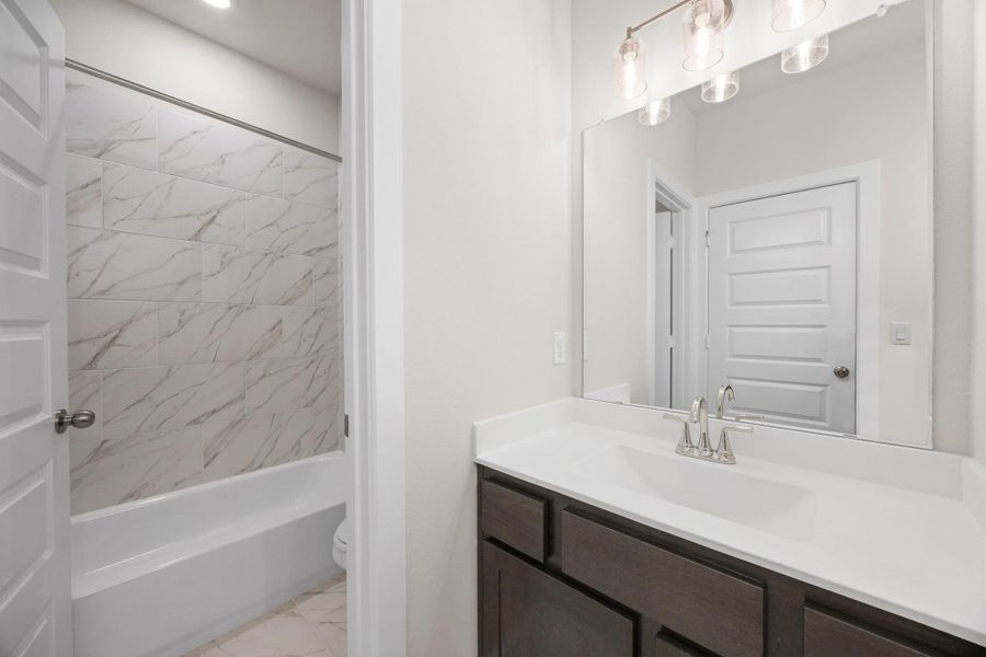 Furnished interior view inside a new home in Parmer Ranch, Georgetown (Image 12).