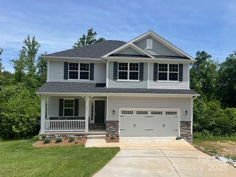 Front exterior of a new home in Northlake, Statesville, NC, highlighting curb appeal (Image 20). Front exterior of a new home in Northlake, Statesville, NC, highlighting curb appeal (Image 20).