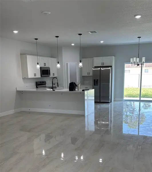 Furnished interior view inside a new home in , Ocala (Image 8).