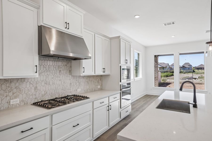 Representative furnished interior of a home built from the Anderson by Taylor Morrison in Travisso, Leander (Image 6).