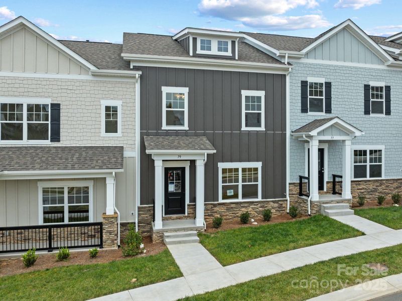 Front exterior of a new home in , Asheville, NC, highlighting curb appeal (Image 20).