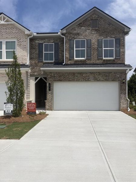 Front exterior of a new home in , Dacula, GA, highlighting curb appeal (Image 1). Front exterior of a new home in , Dacula, GA, highlighting curb appeal (Image 1).