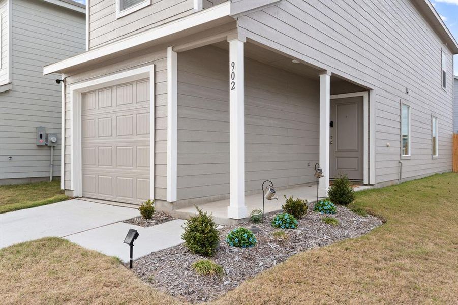 Exterior details and patio area of a home in Tillage Farms: Wellton Haven, Princeton (Image 3).