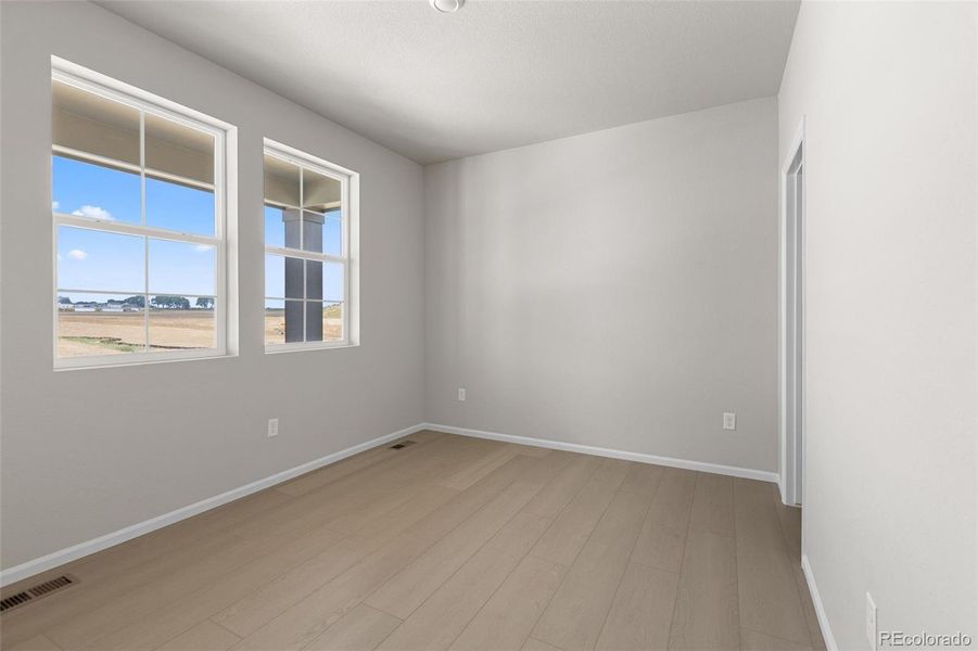 Spacious, unfurnished interior of a new home in The Legacy Collection at Talon Pointe, Thornton (Image 18).