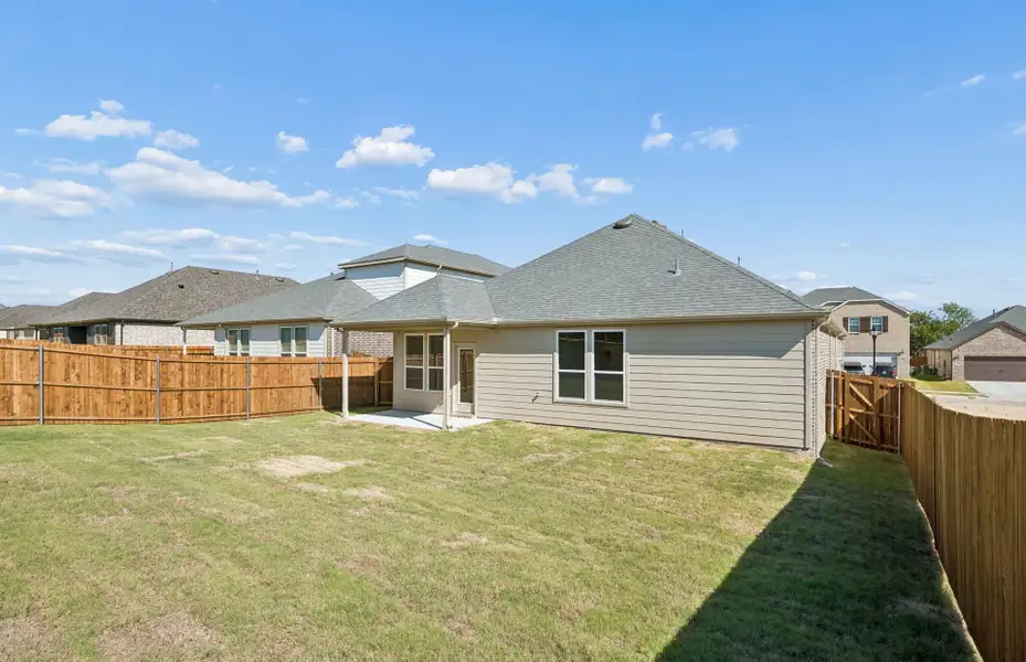 Exterior details and patio area of a home in Rosemary Fields, Godley (Image 2).