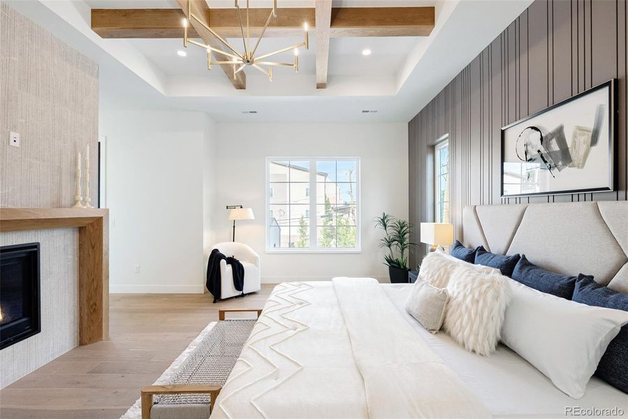 Primary suite is warmed with a private fireplace