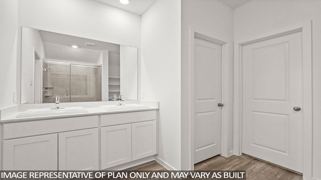 Furnished interior view inside a new home in Sunterra, Katy (Image 9).