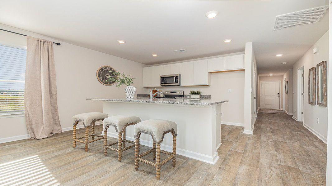 Representative furnished interior of a home built from the DEVON by D.R. Horton in Jordanville Farms, Galivants Ferry (Image 6).