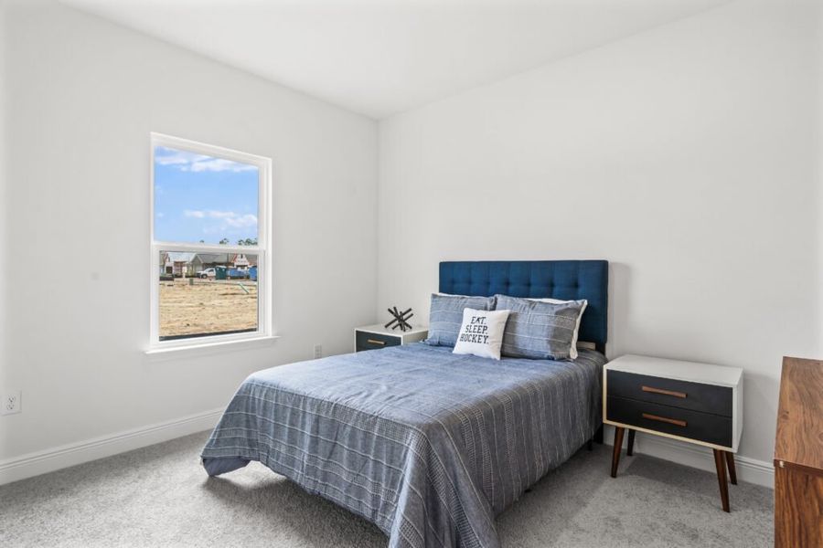 Furnished interior view inside a new home in Natureview, Freeport (Image 4).