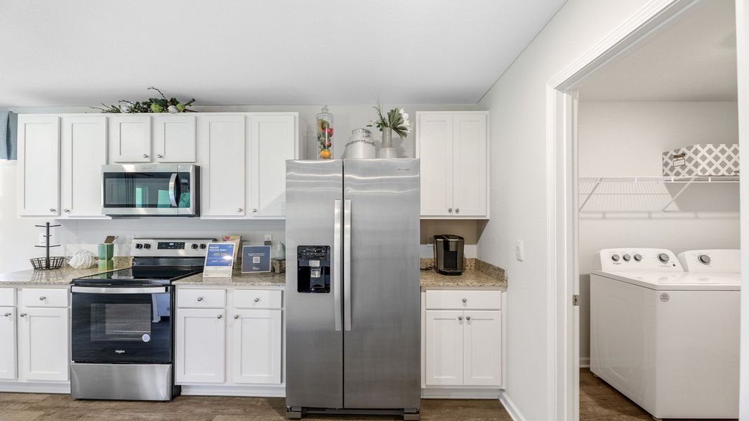 Representative furnished interior of a home built from the The Sawyer by D.R. Horton in The Hammocks, Crawfordville (Image 13).