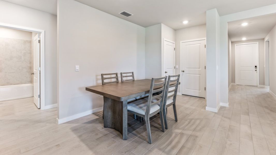 Furnished interior view inside a new home in Palmetto Landing at Babcock Ranch - Express, Punta Gorda (Image 8). Furnished interior view inside a new home in Palmetto Landing at Babcock Ranch - Express, Punta Gorda (Image 8).