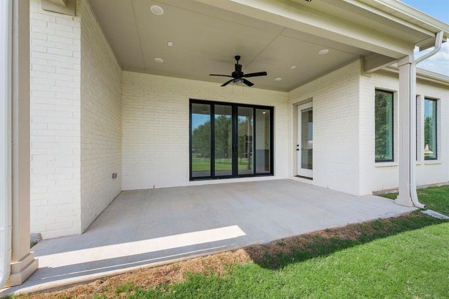 Exterior details and patio area of a home in Highland Oaks, Boyd (Image 16). Exterior details and patio area of a home in Highland Oaks, Boyd (Image 16).