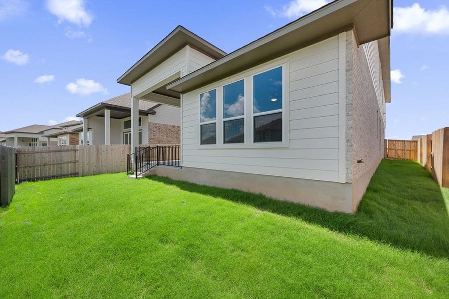 Exterior details and patio area of a home in Lariat, Liberty Hill (Image 28). Exterior details and patio area of a home in Lariat, Liberty Hill (Image 28).