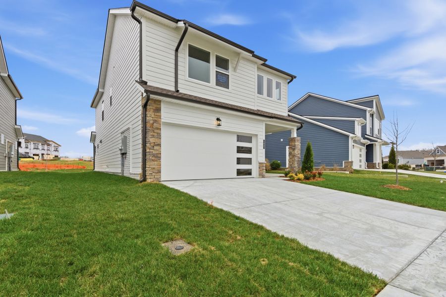 Exterior details and patio area of a home in Nexus – Park Collection, Gallatin (Image 21).