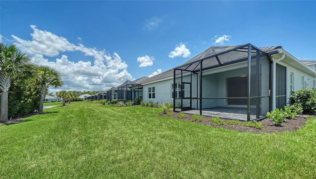 Exterior details and patio area of a home in Windward, Lakewood Ranch (Image 24).