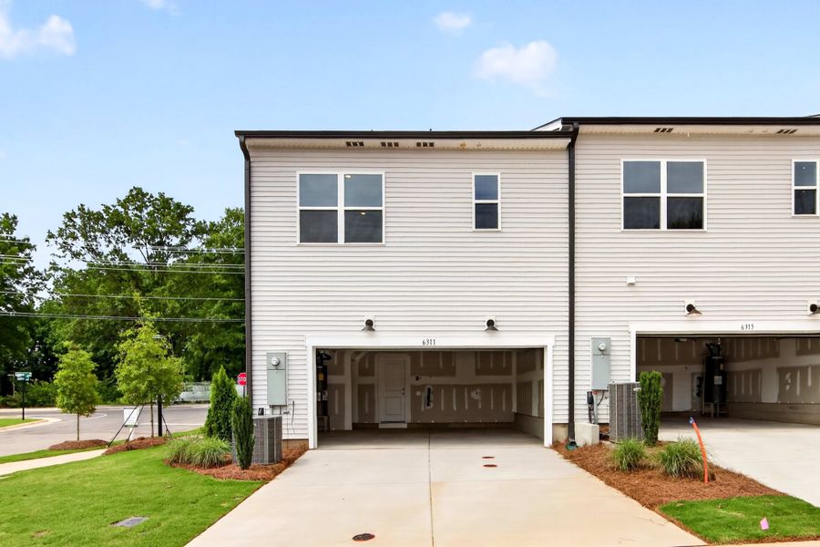 Front exterior of a new home in Amplitude, Charlotte, NC, highlighting curb appeal (Image 19).