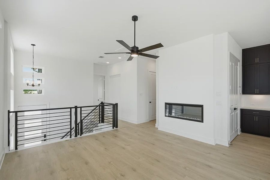 Representative unfurnished interior of a home built from the Athena by Chesmar Homes in Prominence Urban, San Antonio (Image 20).