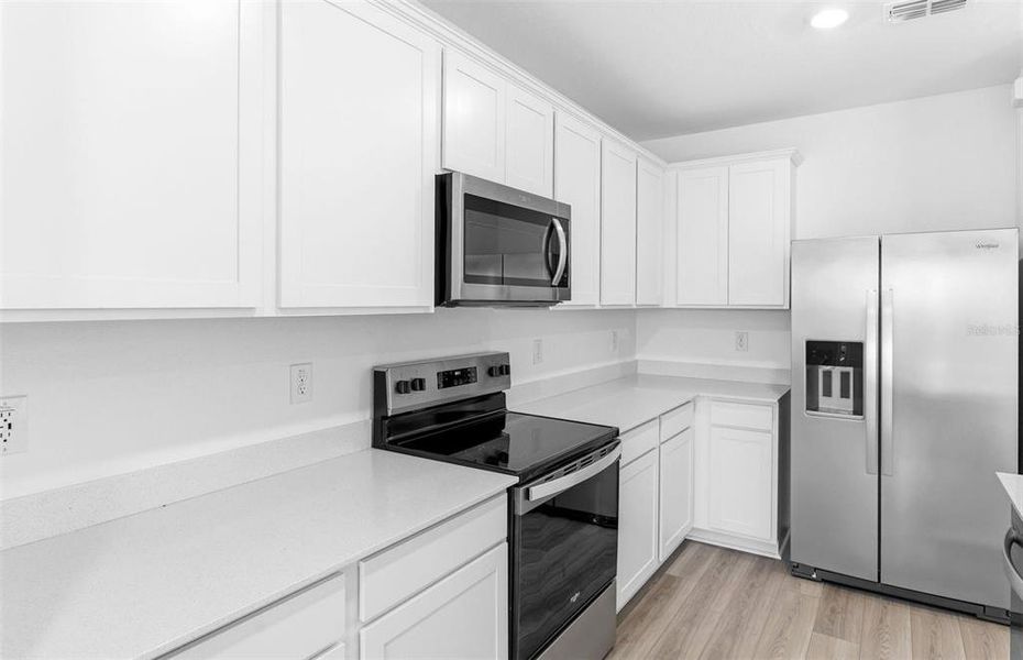 Furnished interior view inside a new home in Oakfield Lakes, Parrish (Image 4).