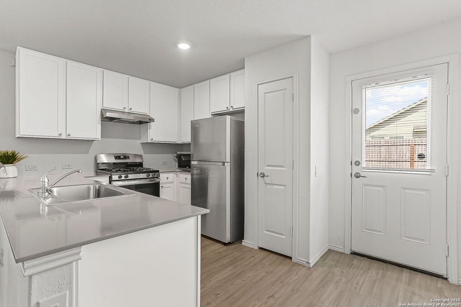 Furnished interior view inside a new home in , San Antonio (Image 8).