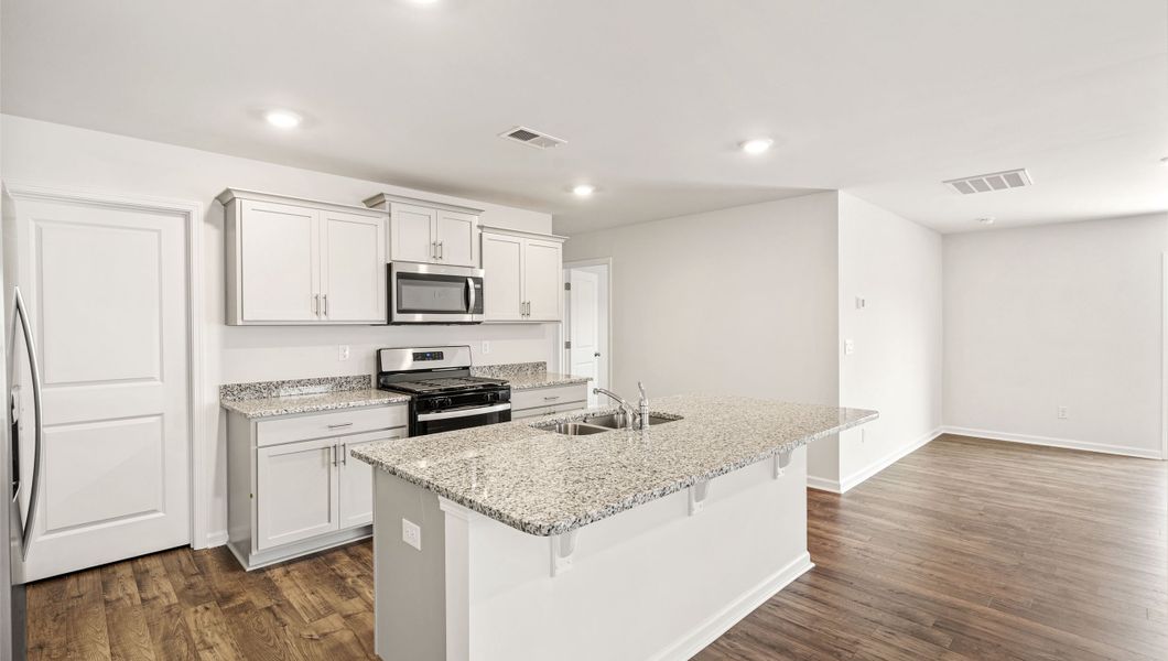 Furnished interior view inside a new home in Paddock Point, Roebuck (Image 7).