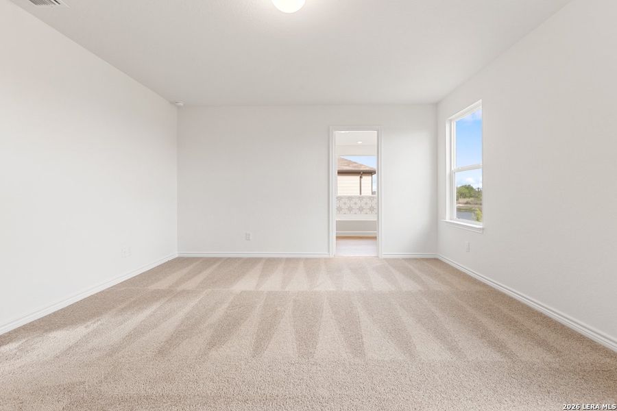 Spacious, unfurnished interior of a new home in Woodside Farms, Seguin (Image 21).