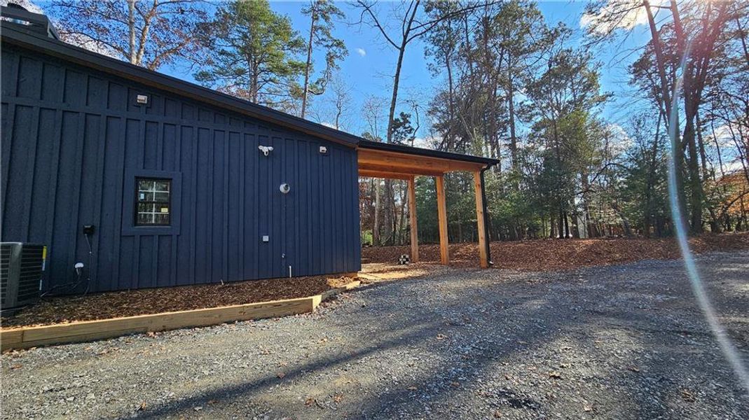 Exterior details and patio area of a home in , Ellijay (Image 2).