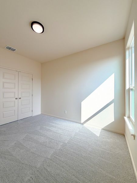 Spacious, unfurnished interior of a new home in TerraVista, Victoria (Image 44).