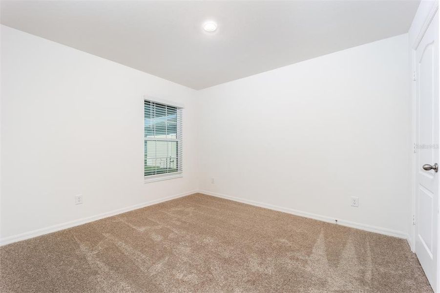 Spacious, unfurnished interior of a new home in Gum Lake Preserve, Lake Alfred (Image 17).