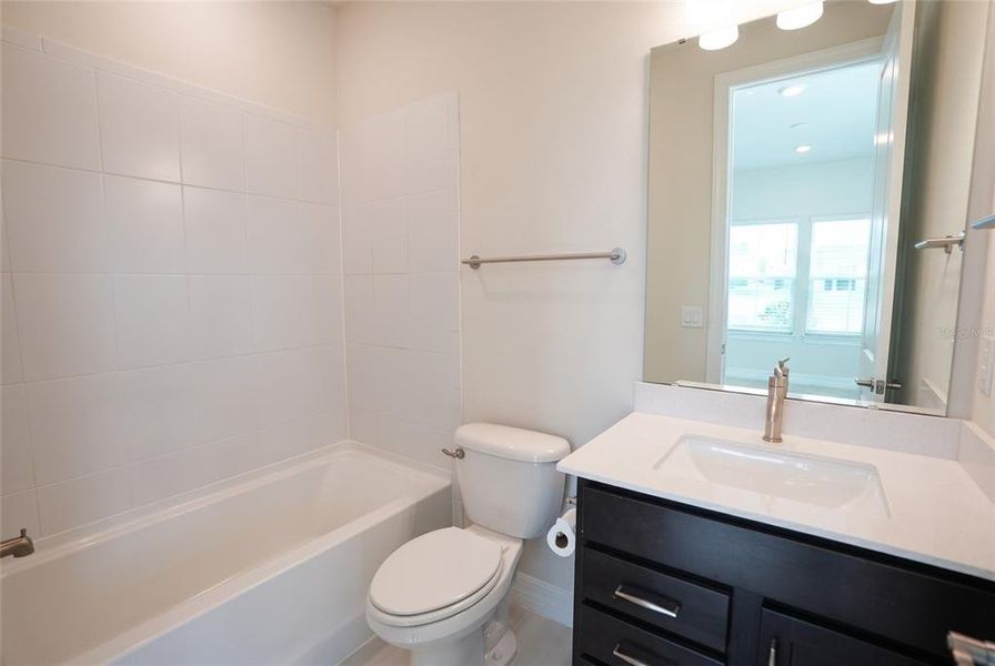 Furnished interior view inside a new home in Parkview Reserve, Orlando (Image 11).
