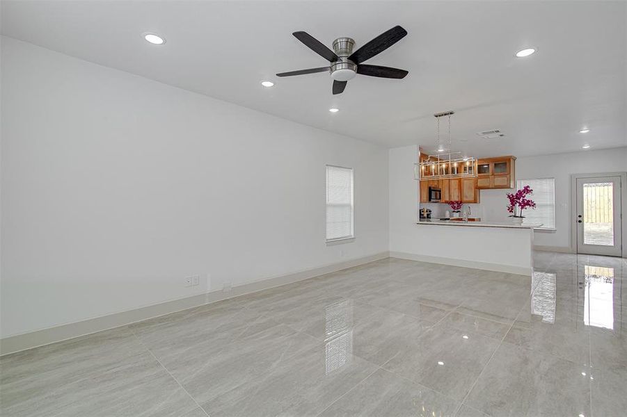 Open floor concept- Connecting the living room, dining room and the kitchen.