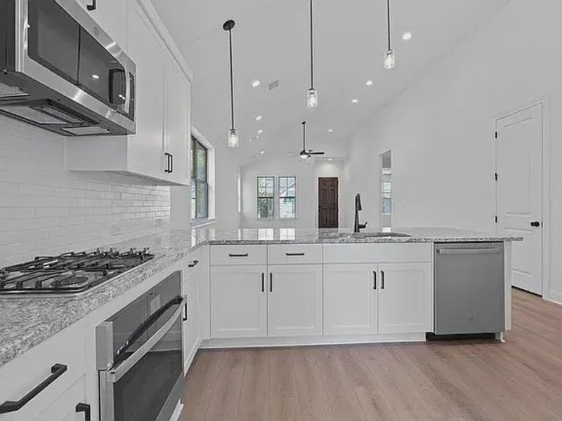 Furnished interior view inside a new home in The Porch at Du Pre, Buda (Image 7).